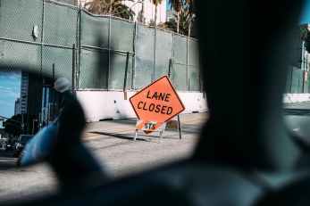 closed construction road road sign