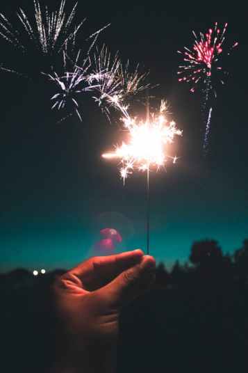 selective focus photography of sparkler